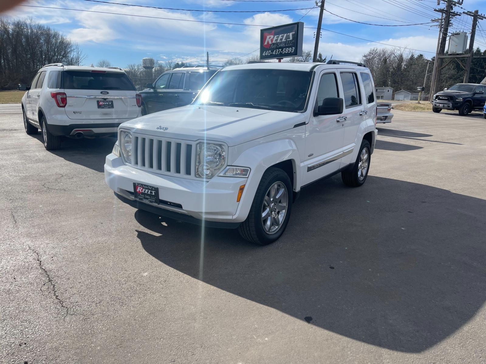 2012 White /Black Jeep Liberty Latitude 4WD (1C4PJMAK0CW) with an 3.7L V6 SOHC 12V engine, 4-Speed Automatic transmission, located at 547 E. Main St., Orwell, OH, 44076, (440) 437-5893, 41.535435, -80.847855 - Photo #0